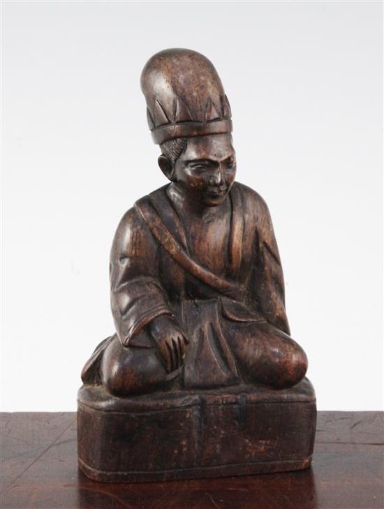 A Chinese Jichimu seated figure of a monk, 19th century, 8cm